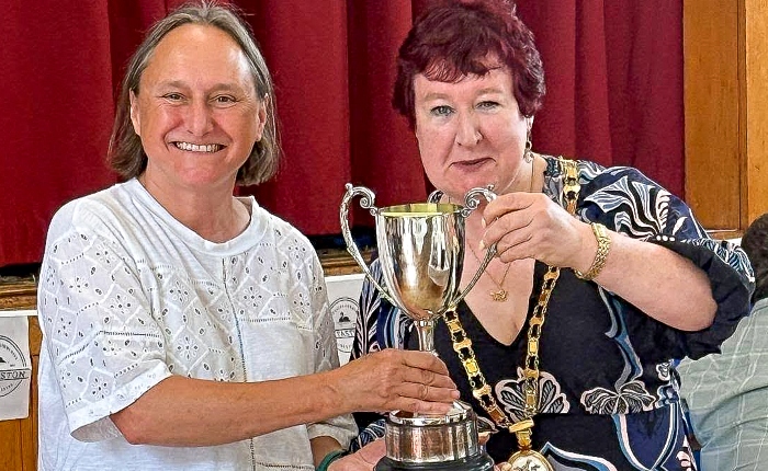 A trophy presentation at the 2026 Flower and Produce Show